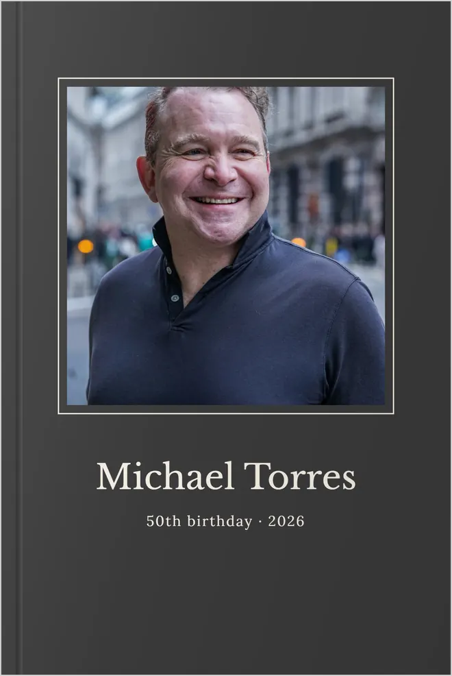 A StoryKnit hardcover for Michael Torres in charcoal, for his 50th birthday